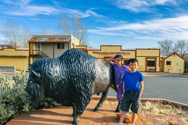 children in front of buffalo statue Little Hollywood Kanab Utah | justonecookbook.com