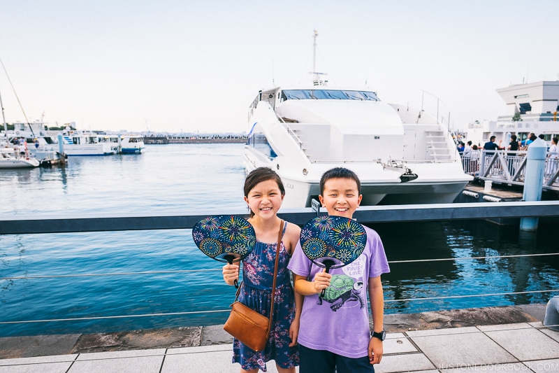 children in front of a boat at Yokohama pier - Japan's Fireworks Hanabi | www.justonecookbook.com