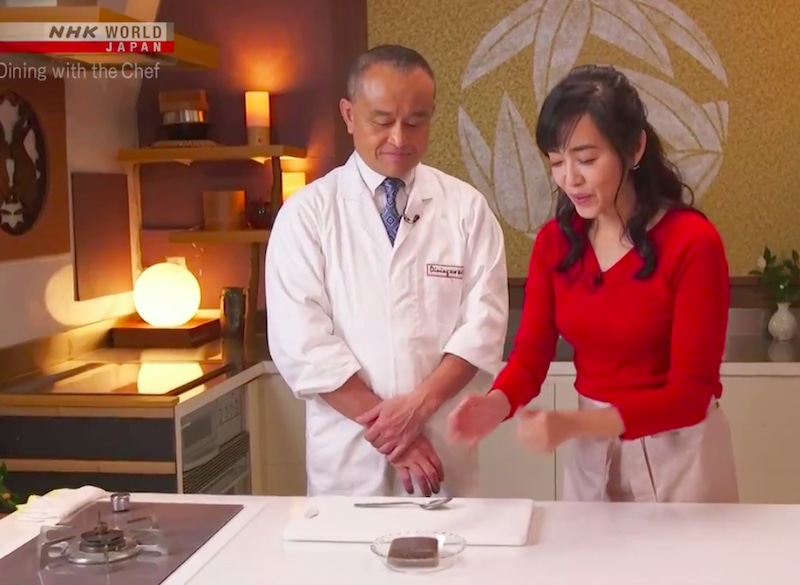 A man and woman in the kitchen