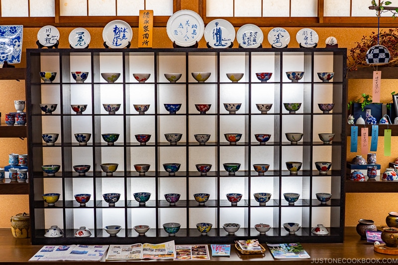 porcelain rice bowl on a backlit display shelf at Okawachiyama Village