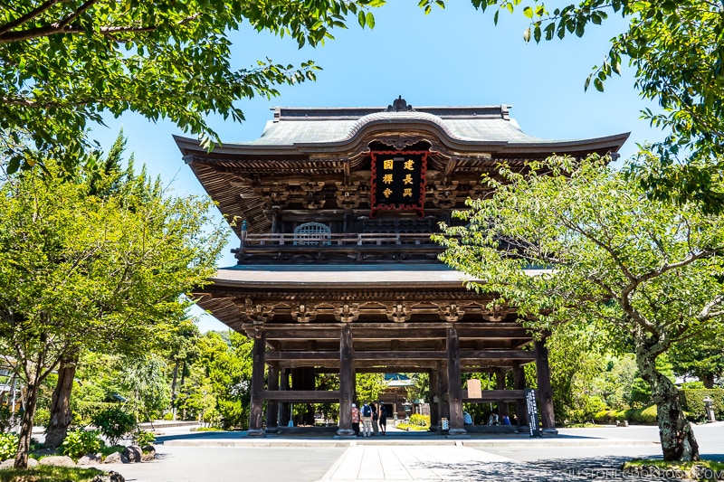 large wooden temple structure 3 stories tall