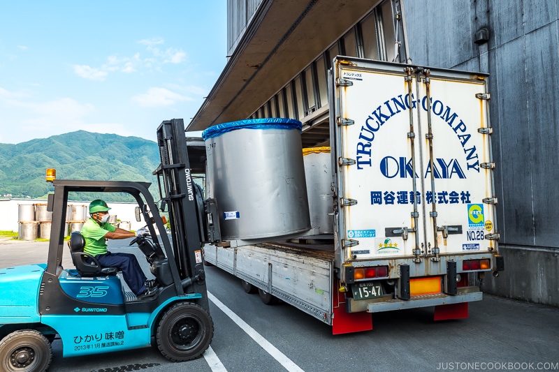miso container on a fork lift loading into a truck