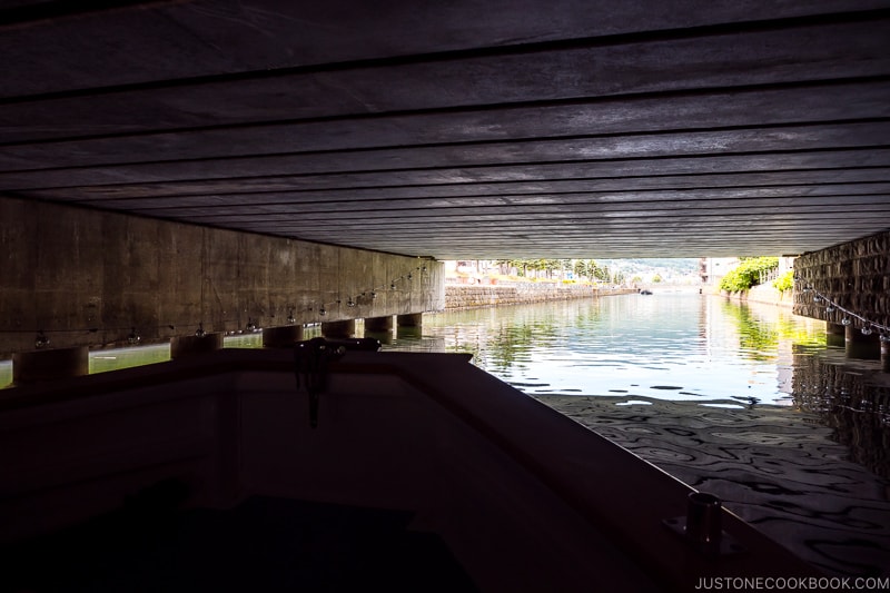view of Otaru Canal from the cruise under the bridge