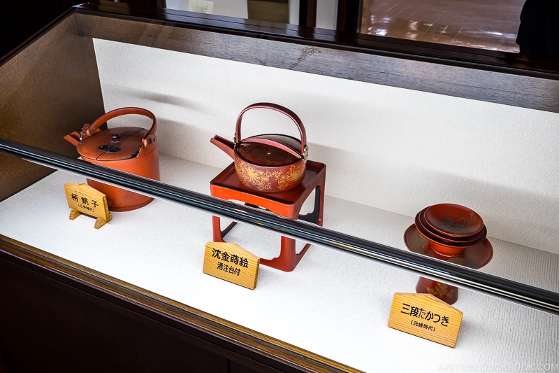 various type of sake serving ware in a display case