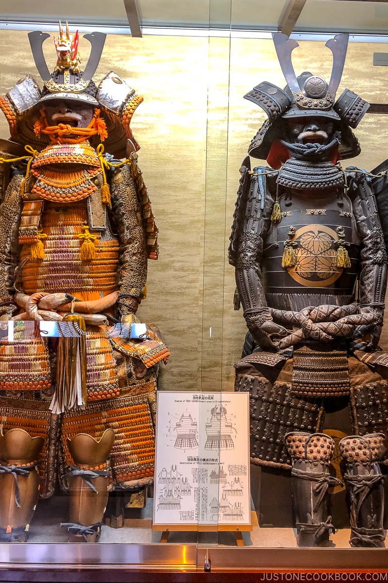 samurai armor in a glass display case
