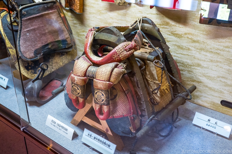 antique saddle in a display case