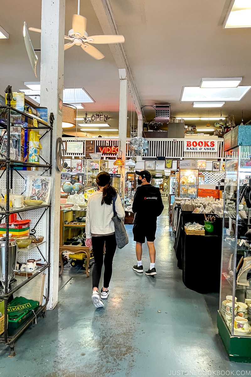 people browsing inside antique store