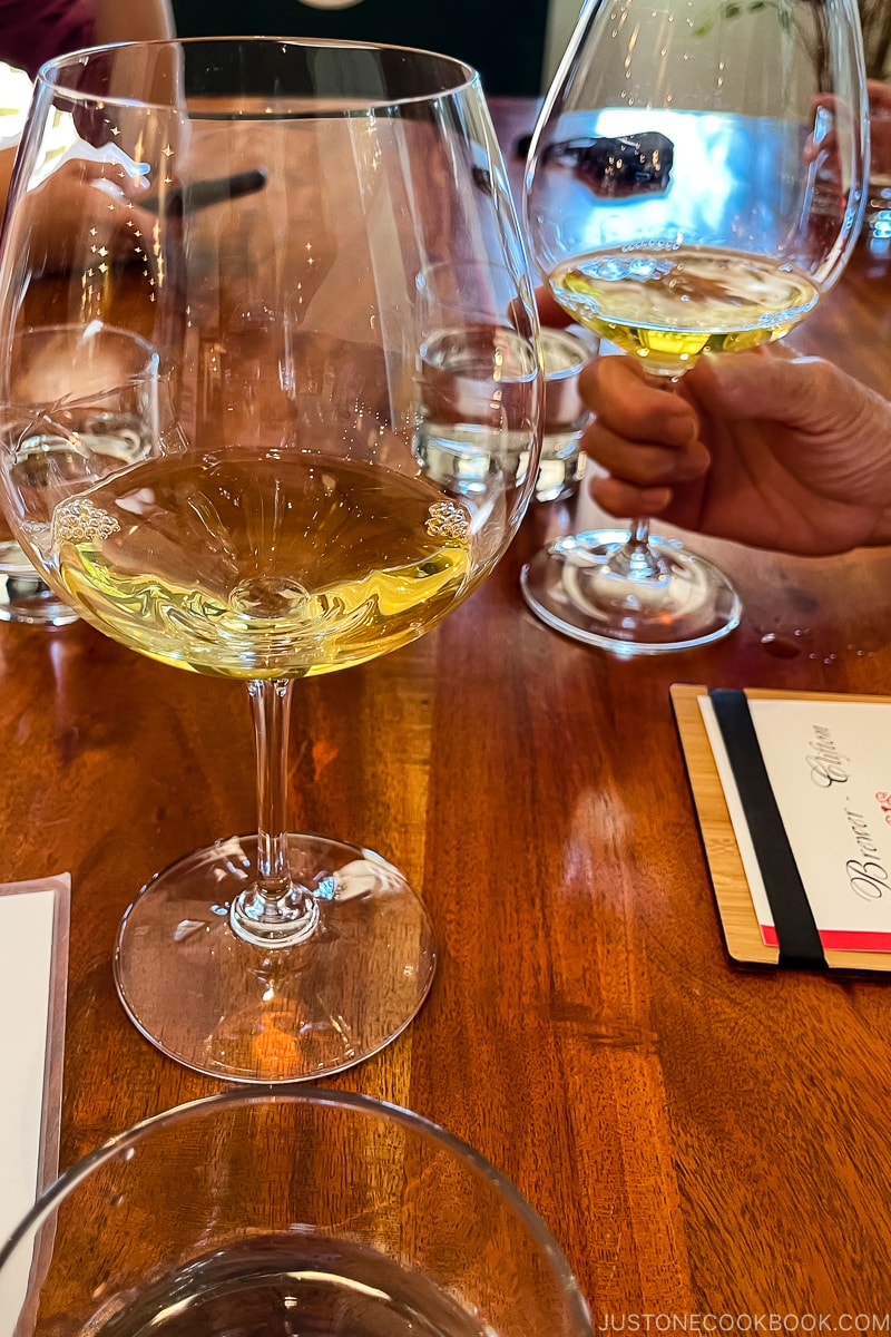 glasses of wine on a wood table
