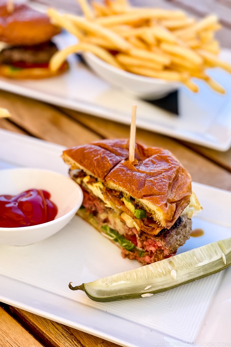 half a burger on a plate