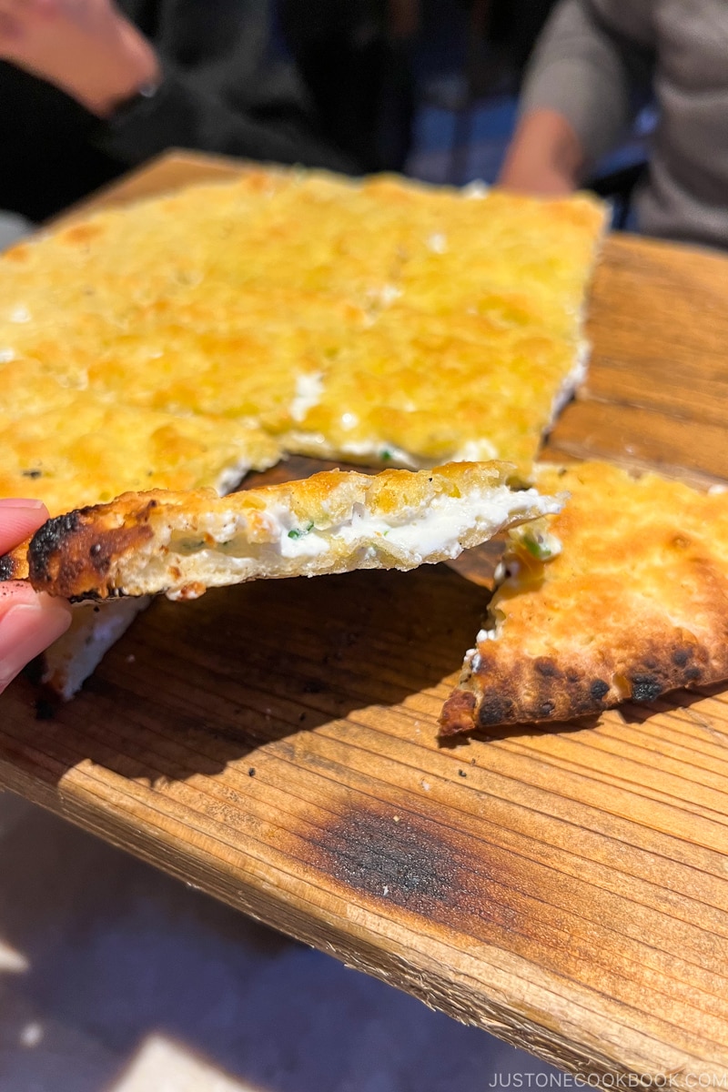 deluxe focaccia with taleggio cheese, truffle oil and fresh herbs