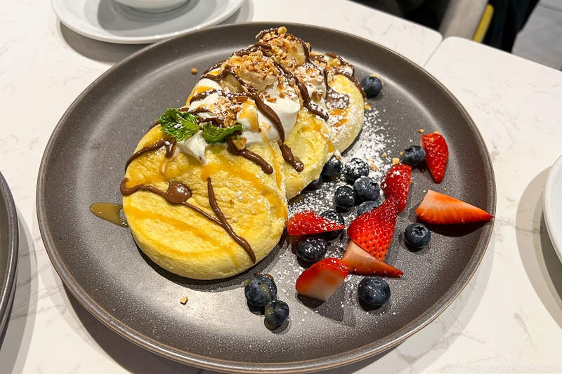 Nutella souffle pancake with fruits on a plate