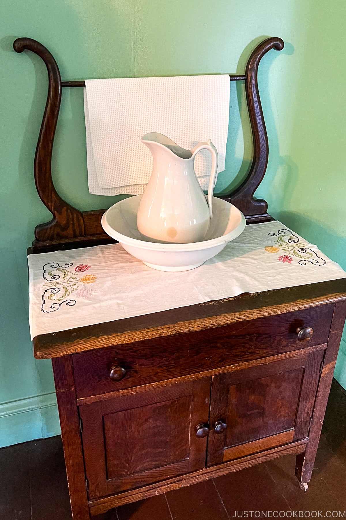 pitcher on a night stand