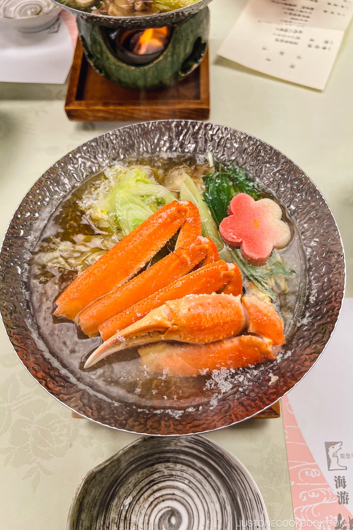 crab cooking in a silver pot