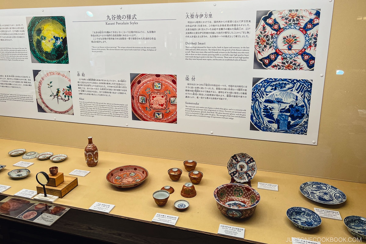 various Kutaniyaki porcelains in a display case