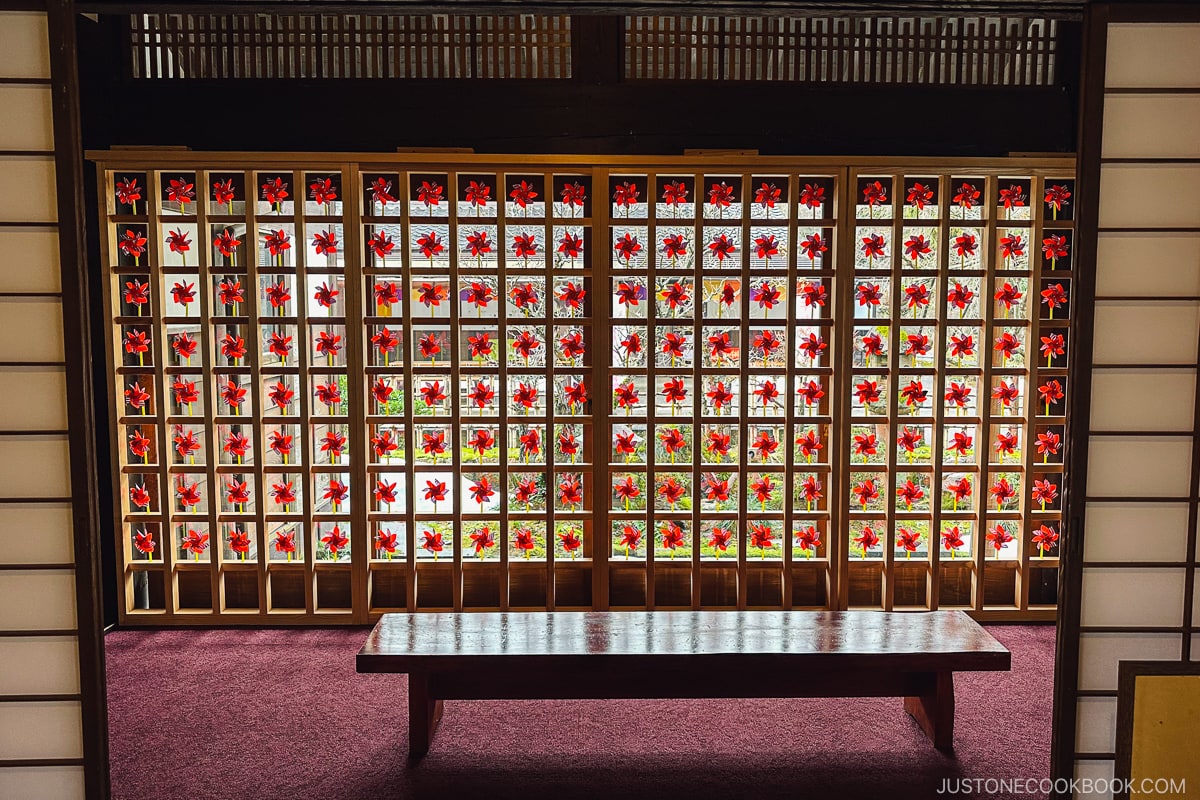 rows of pinwheels in a wood frame