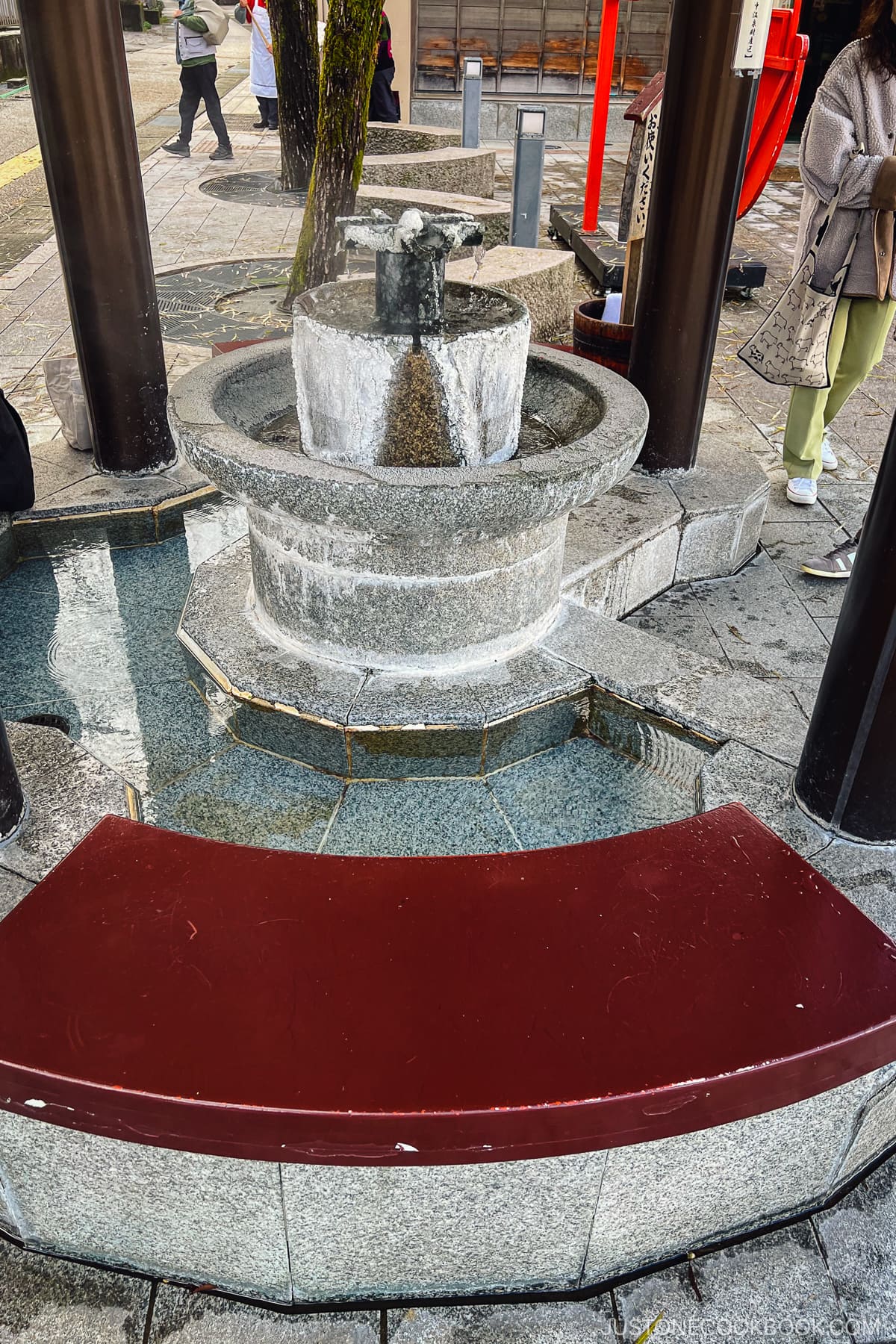 a foot onsen with seating area