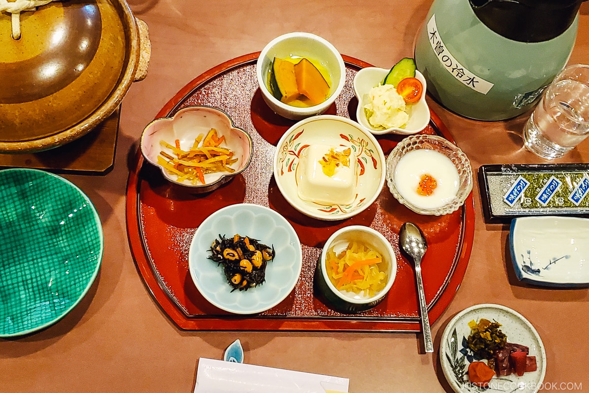 small dishes on a red tray