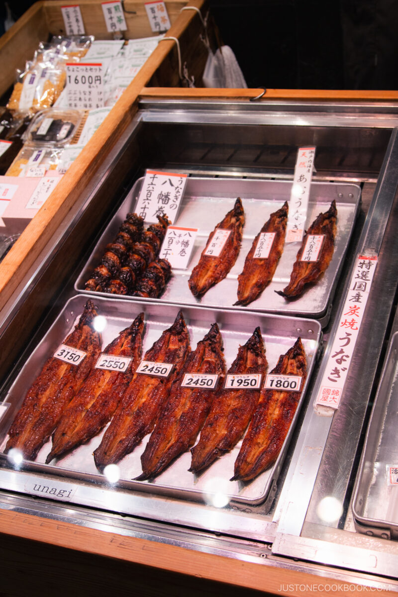 grilled eels on a silver tray