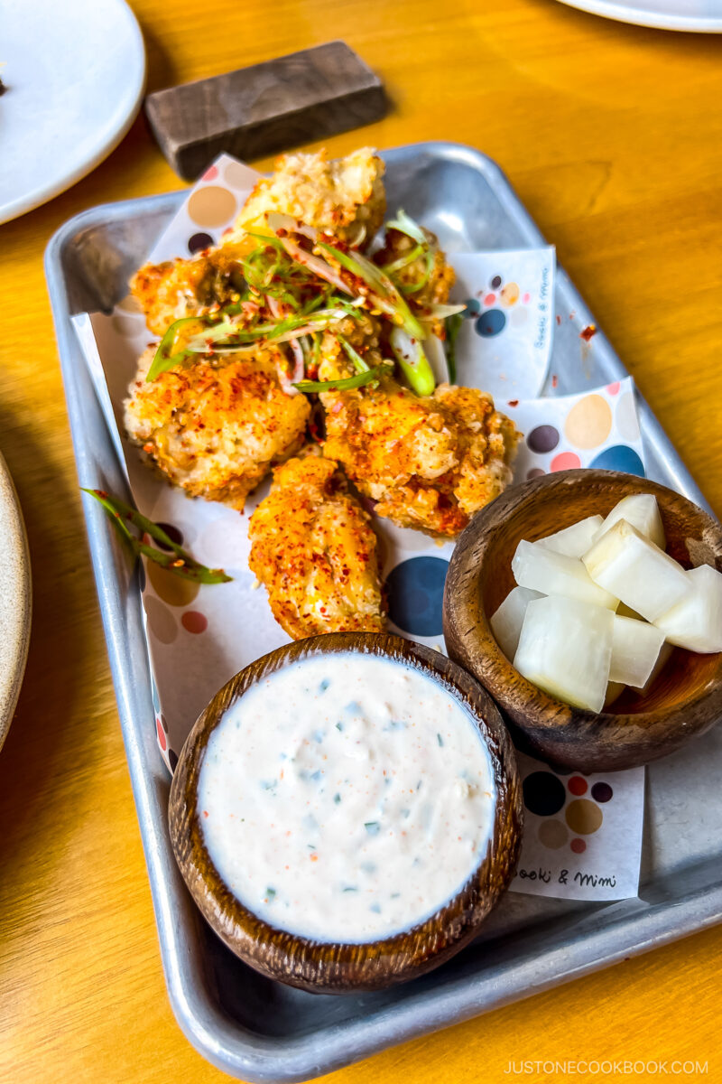 korean fried chicken wings on a tray