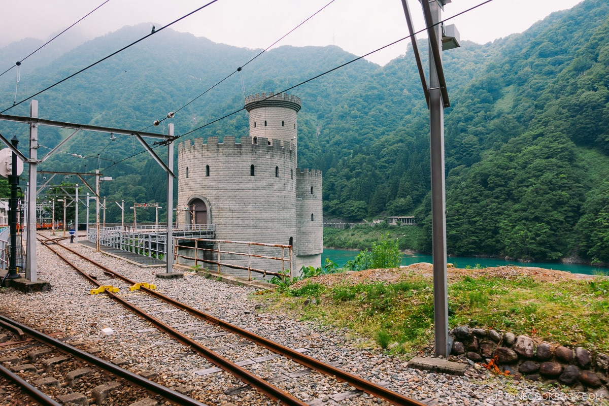 View from Kurobe Gorge Railway of a castle like building