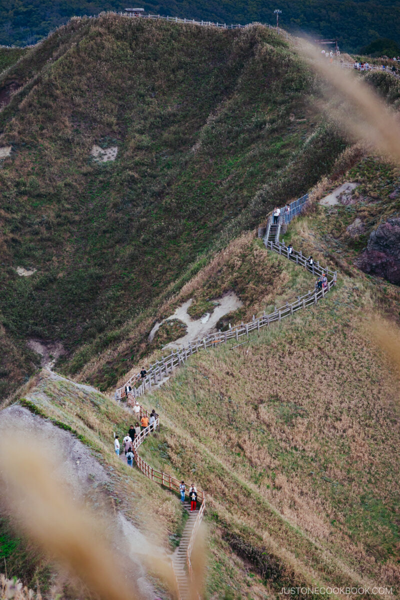 People walking along Charenka's path at Cape Kamui