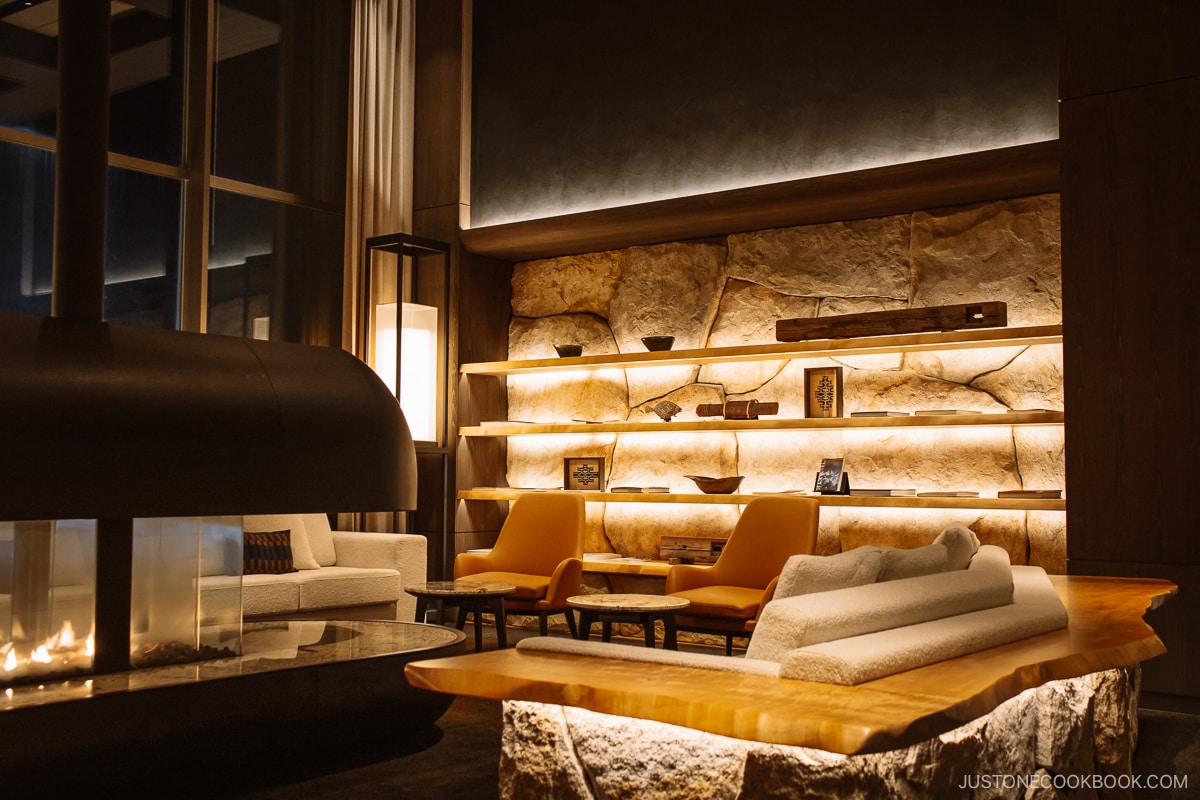 Hotel lobby lounge with fire pit at night at night
