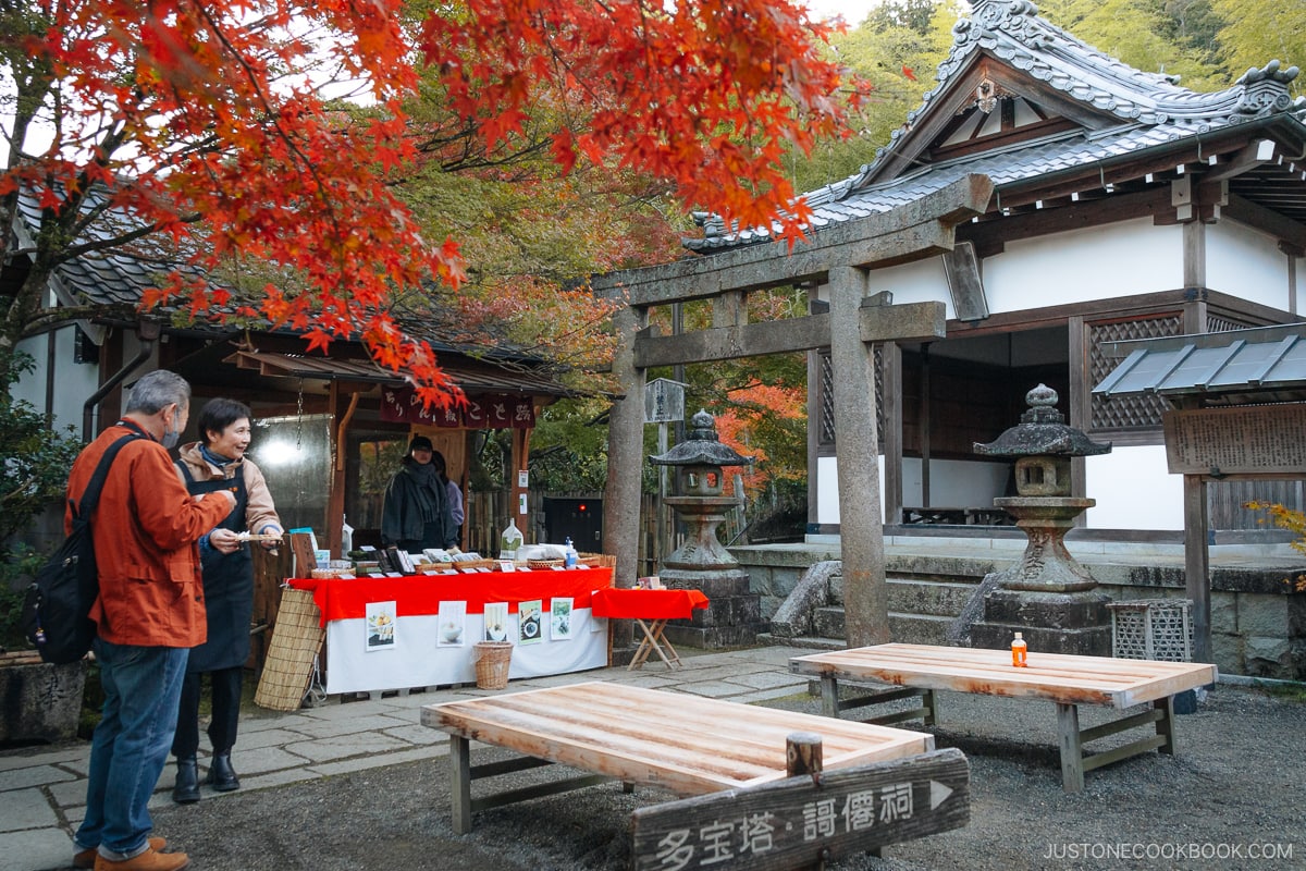 Resting spot in front of a shrine and torii gate