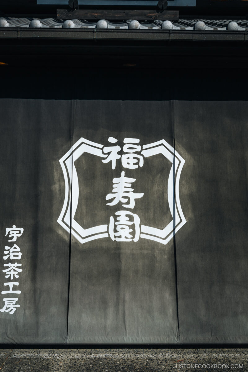 White shop sign on black fabric