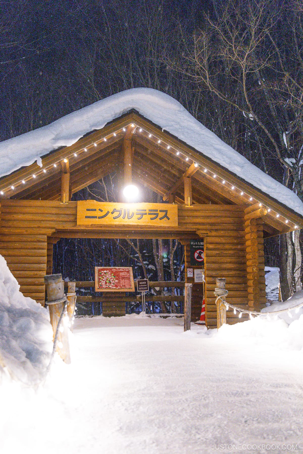 Wooden entrance to Ningle Terrace in Furano covered in snow