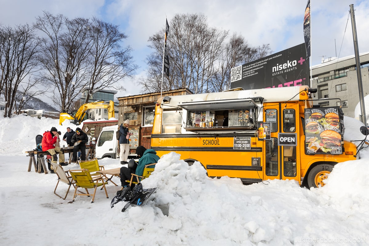 Schoolbus food truck selling burgers