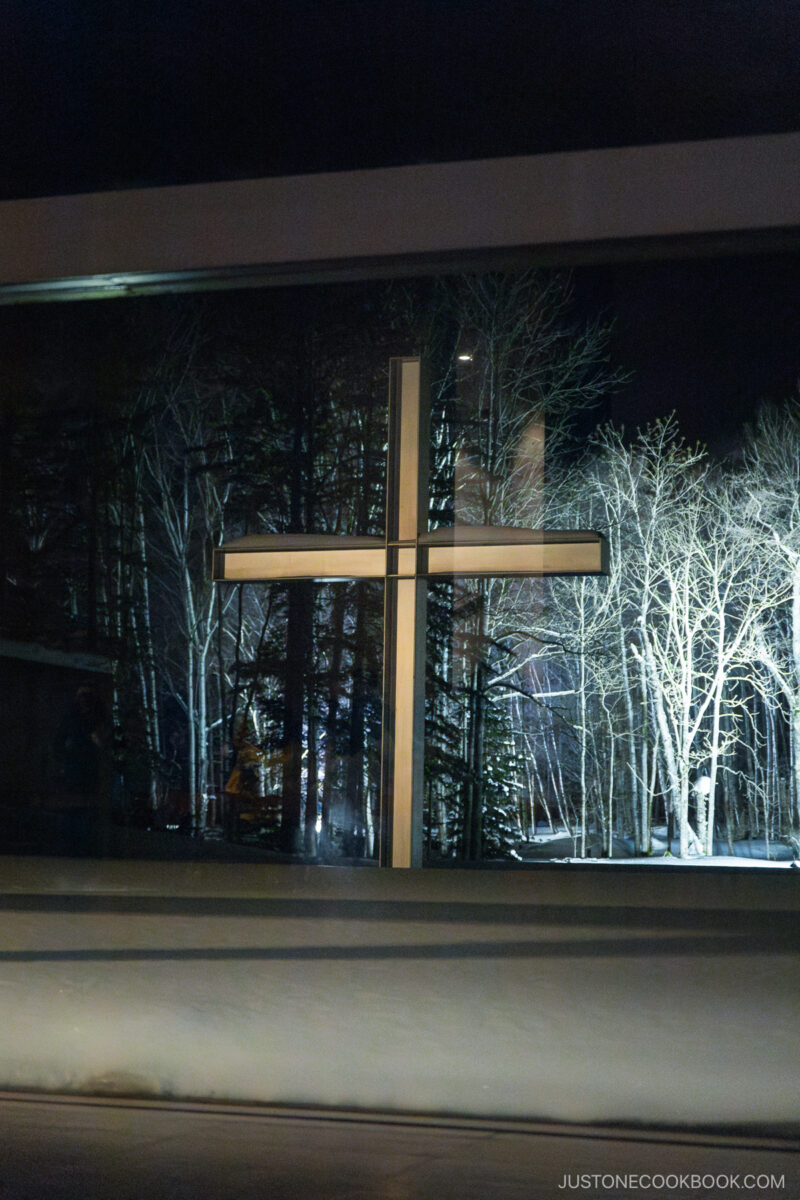 Chapel on the Water cross outside in the snow