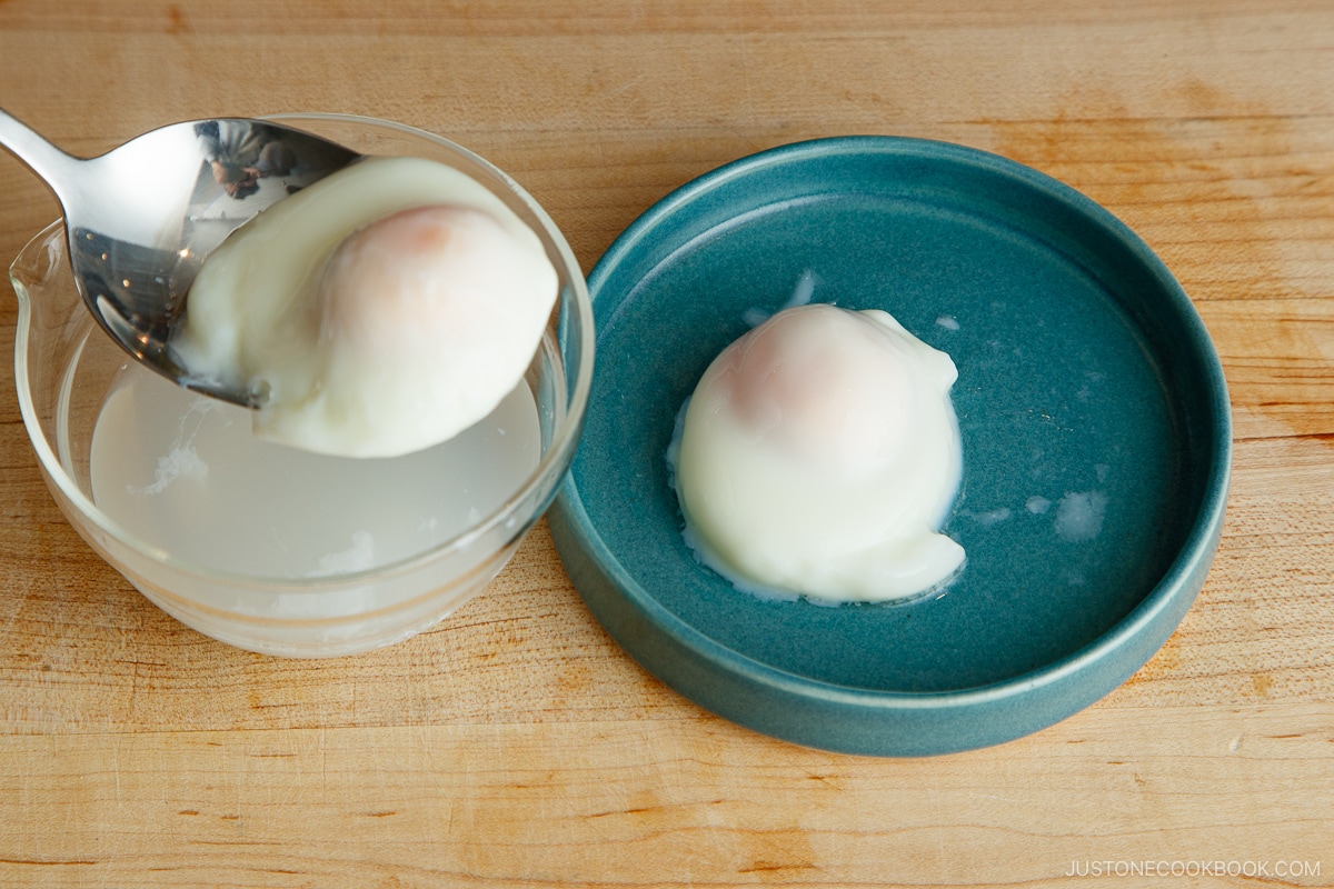 A plate containing Onsen Tamago (Japanese hot spring egg) made with a microwave.