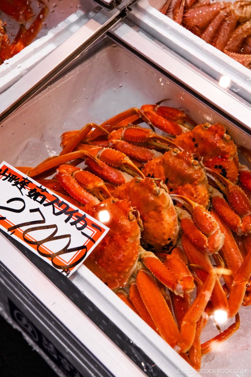 Whole snow crab in a fridge