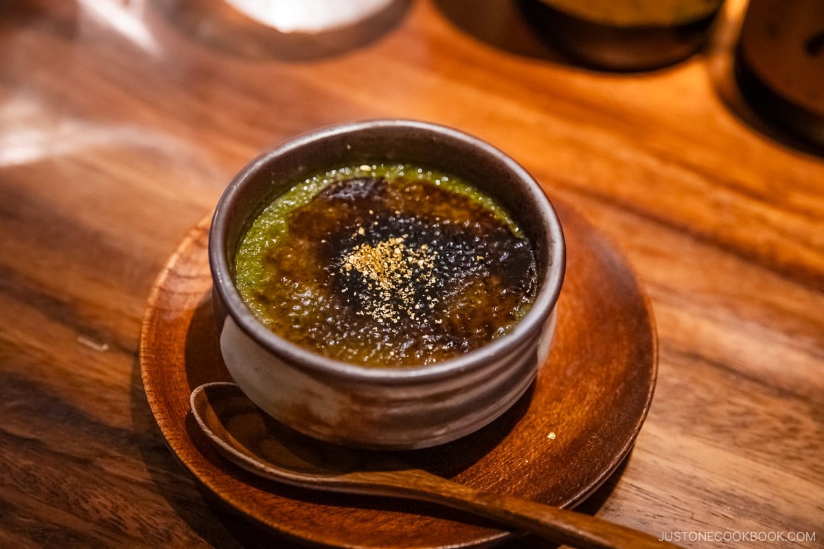 Matcha crème brûlée with gold leaf on top