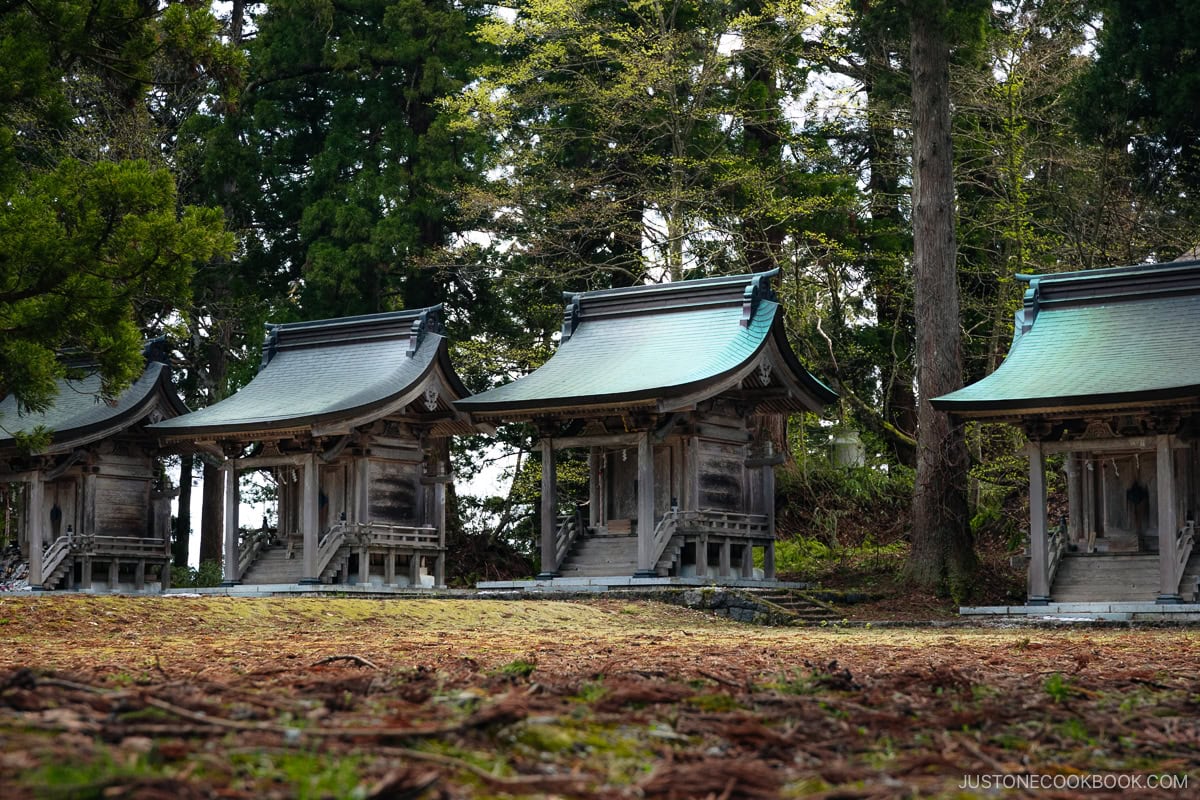 Line of small wooden shrines