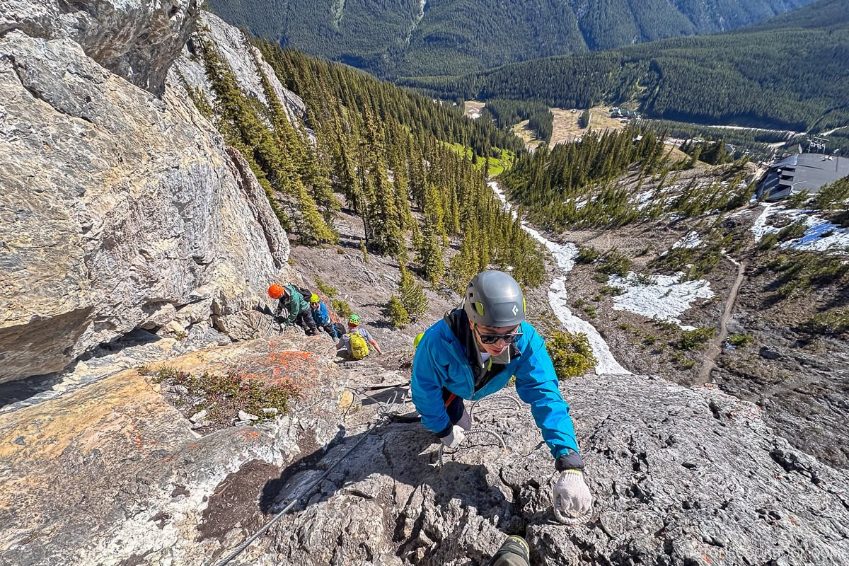 people climbing on Mount Norquay Via Ferrata