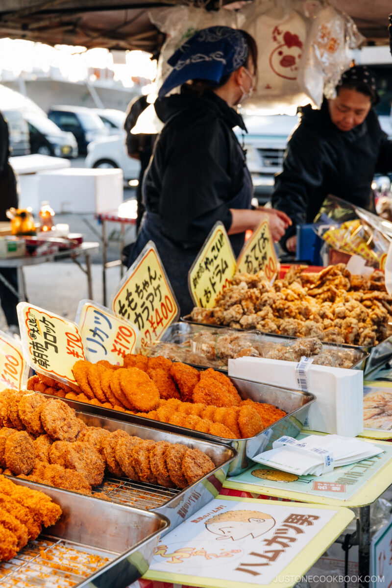 Selection of fried food at market stall