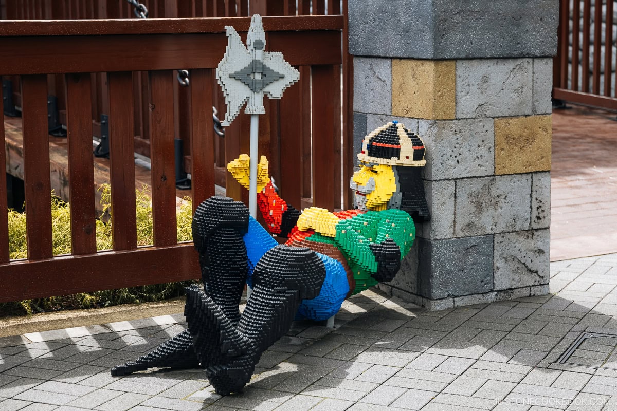 Knight made from Lego resting on the ground
