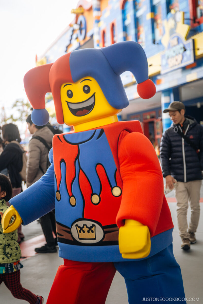Person in clown Lego costume