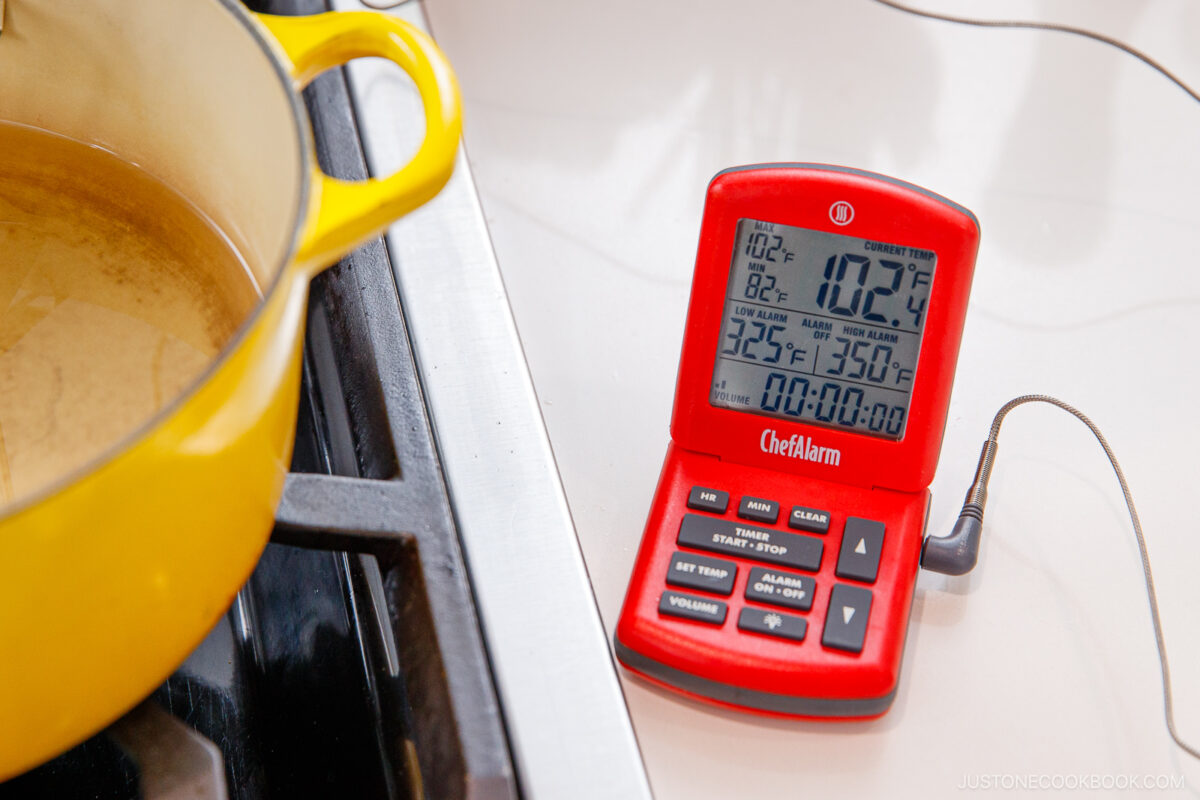 Preheating the oil.