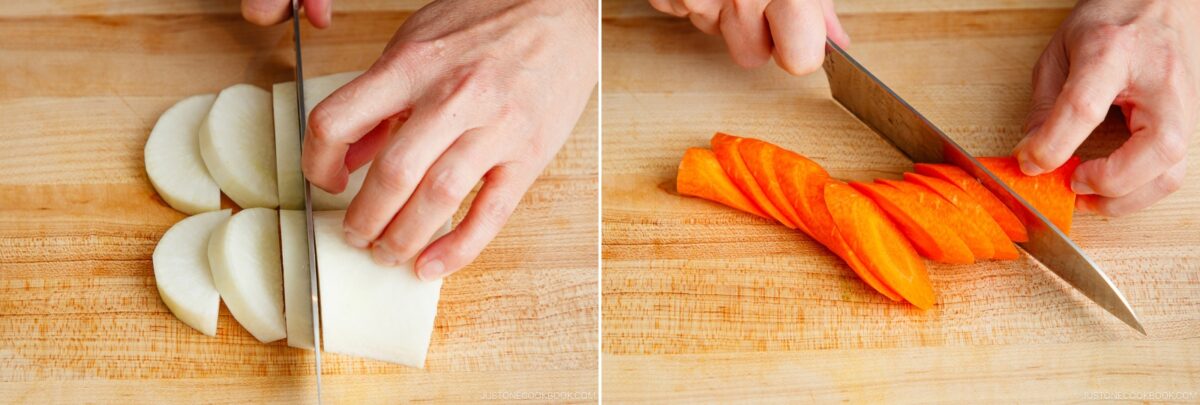 A person’s hands slice a white onion on the left and an orange carrot on the right, both on a wooden cutting board with a sharp kitchen knife during Japanese hot pot meal prep.