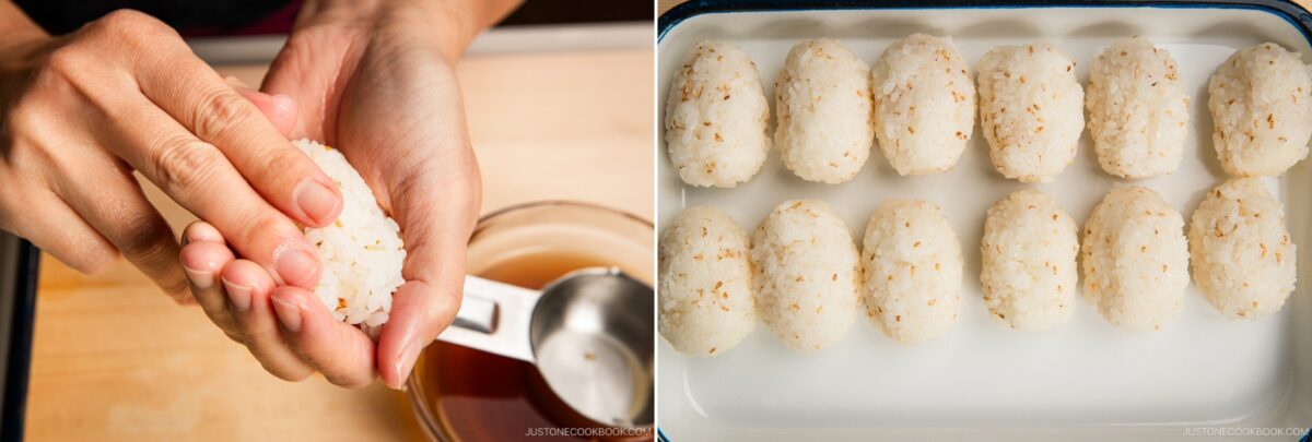 A person shapes rice into an oval with their hands next to a measuring cup of liquid; beside it, twelve oval-shaped inari sushi rice balls are neatly arranged in a white tray.
