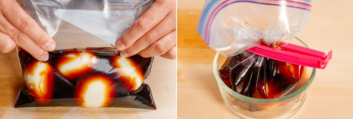 Close-up of hands sealing a plastic bag with ramen eggs in dark sauce (left) and the sealed bag of eggs clipped and resting in a glass bowl (right), both on a wooden surface.