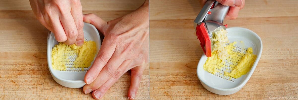 Two side-by-side photos: on the left, hands grate fresh ginger for a bok choy and tofu stir-fry; on the right, hands press ginger with a garlic press onto a ceramic grater, all on a wooden surface.