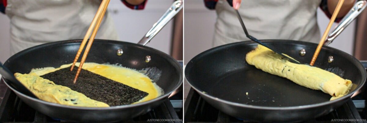 A person uses chopsticks and a spatula to make Dashimaki Tamago, a Japanese dashi rolled omelette with a sheet of seaweed inside, cooking in a nonstick frying pan on a stovetop.